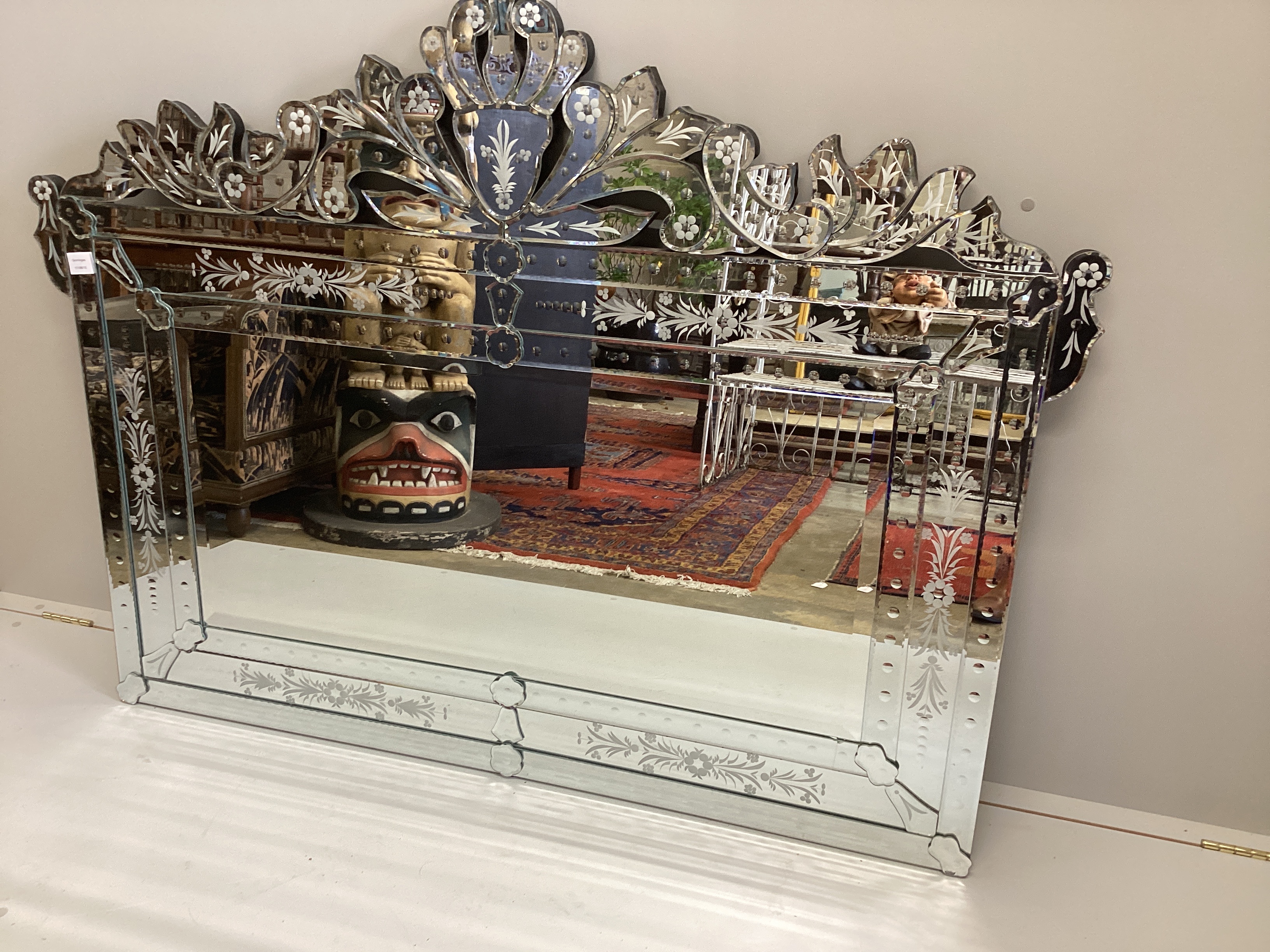 A Venetian style engraved glass overmantel mirror, width 150cm, height 115cm